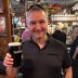 James Elson with a pint of Guinness