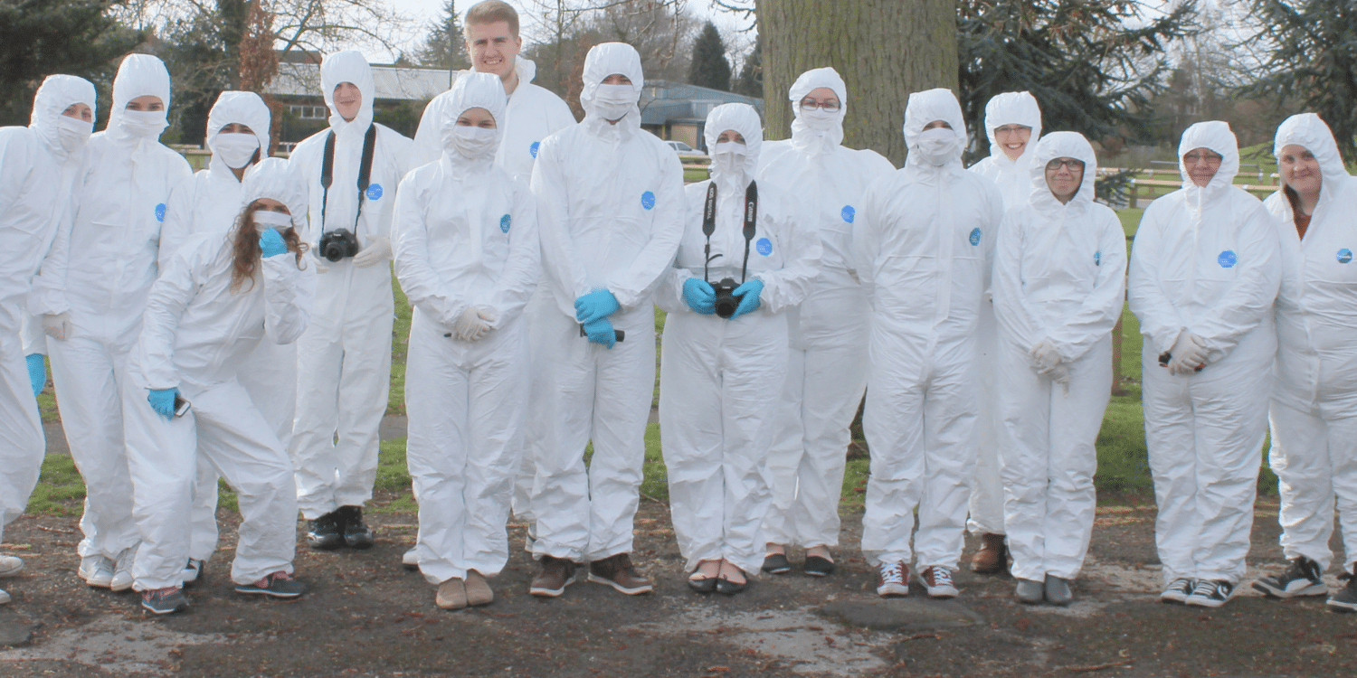 Group in safety suits