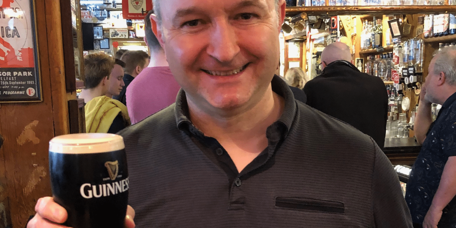 Jamesy enjoying a Guinness in his favourite pub, which features in our Best of Belfast Map